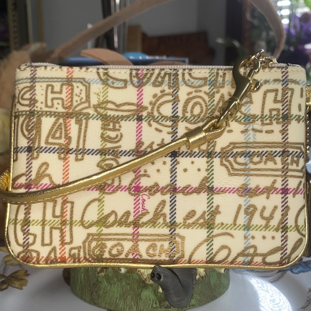 COACH Cream Multicolor Signature wristlet with Gold Trim